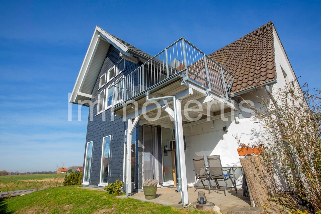 Außergewöhnliches Zweifamilienhaus mit Architektenanbau