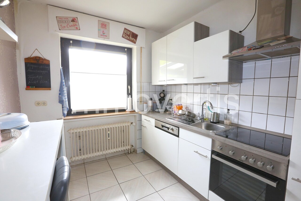 Bungalow mit zwei Wohnungen in Hanglage